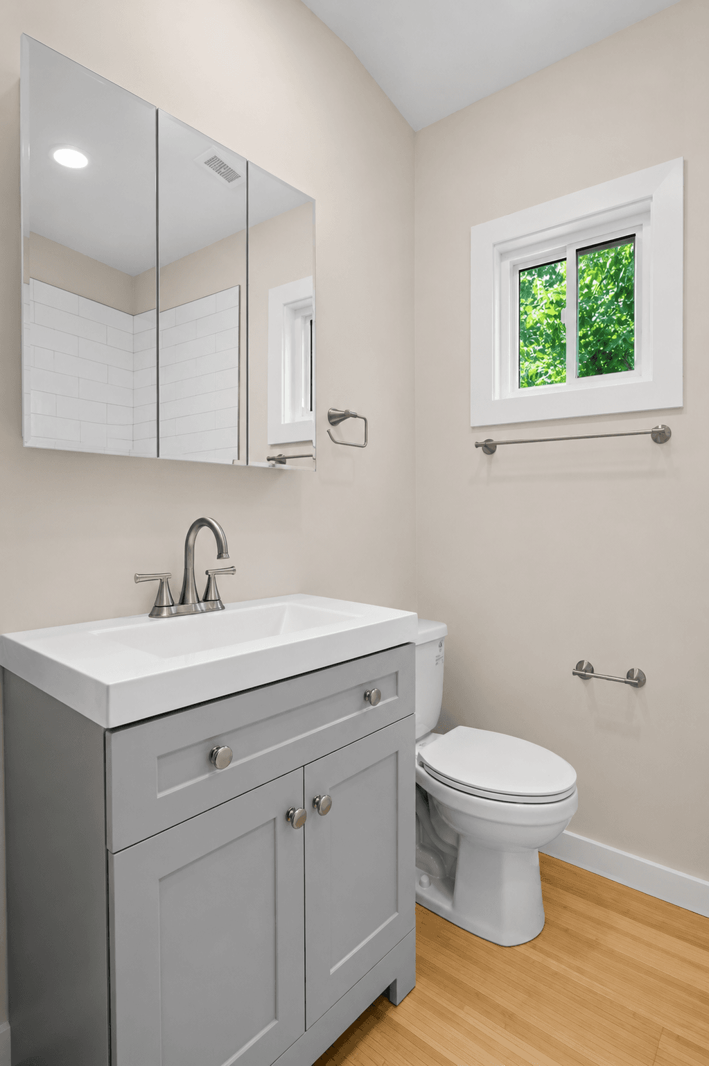 Standard Cottage 2 Bed, bathroom with grey shaker vanity and brushed nickel fixtures